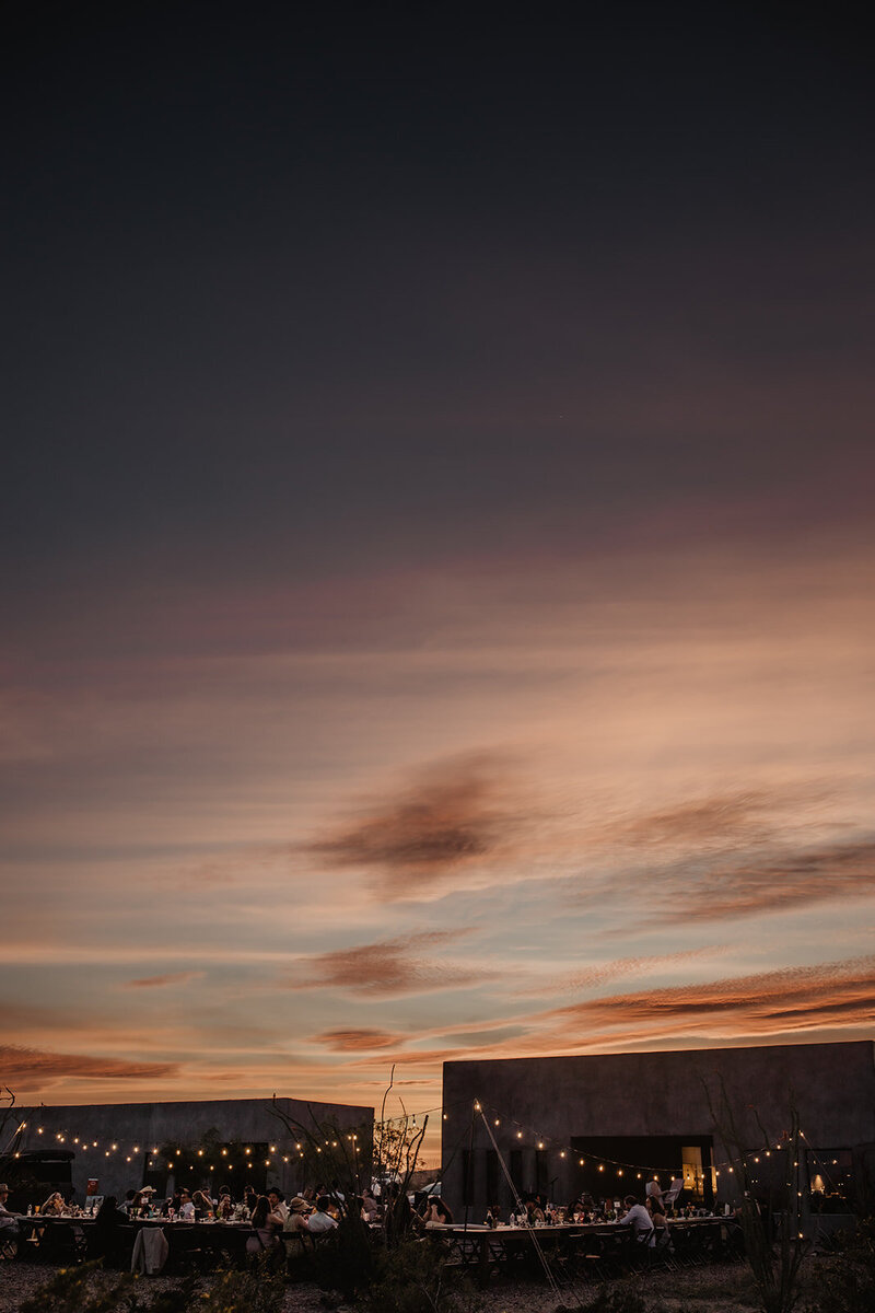 Desert wedding reception at sunset